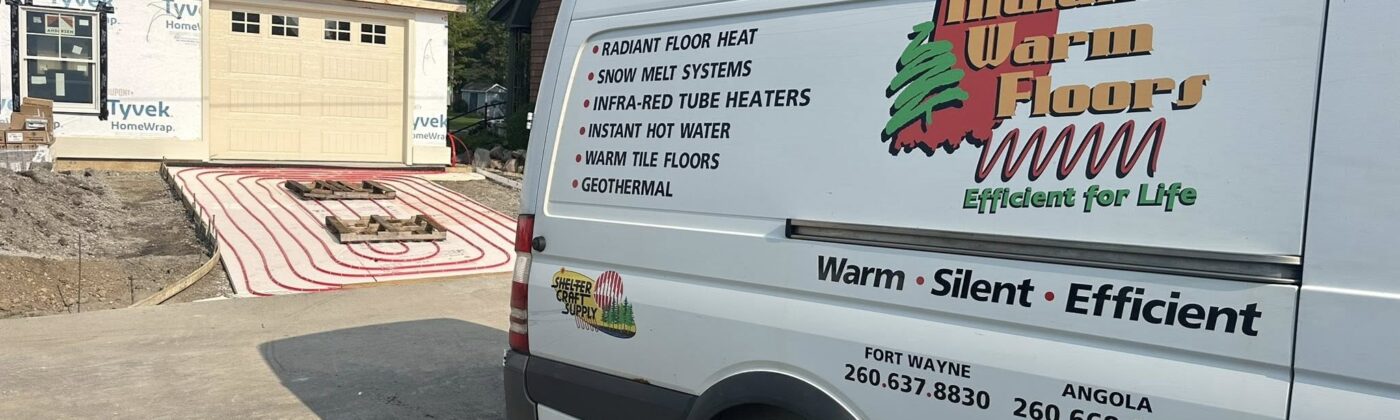 Indiana Warm Floors service van beside a new garage slab with radiant heating tubing installed