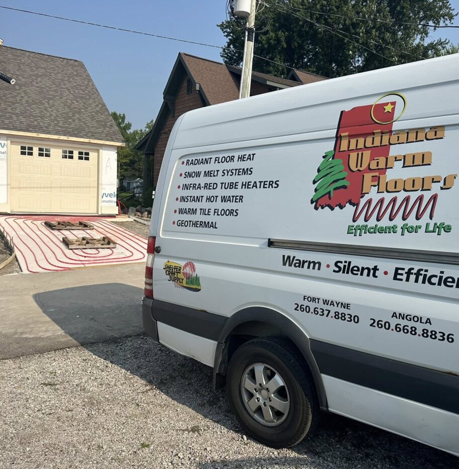 Indiana Warm Floors service van beside a new garage slab with radiant heating tubing installed