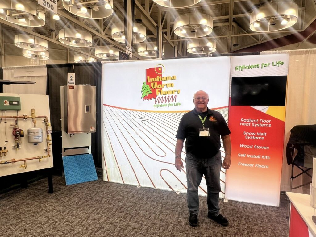Indiana Warm Floors trade show booth featuring radiant floor heat, snow melt systems and hydronic equipment